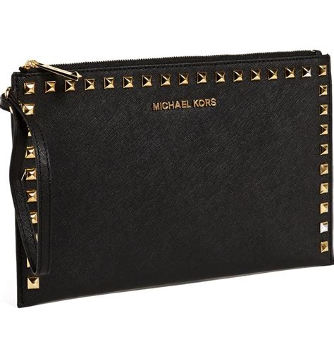 michael kors large clutch|Michael Kors studded clutch.